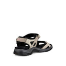 Beige and black sandal on a white background