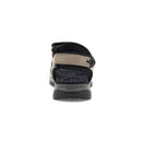 Black sandal with a strap on a white background