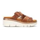 Brown sandal with a platform sole on a white background