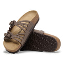 Brown sandals with cork sole on a white background