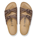 Brown Birkenstock sandals on a white background