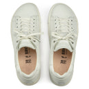 Pair of white sneakers with visible brand logo on a white background