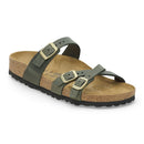 Green sandal with cork sole on a white background