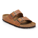 Brown sandal with cork sole on a white background