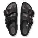 Black sandals with double buckles on a white background