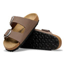 Brown sandals with cork sole on a white background