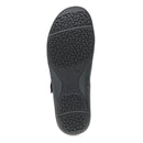 Black shoe sole with tread pattern on a white background
