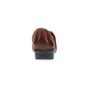 Brown leather shoe on a white background