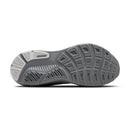 Close-up of a running shoe sole with tread pattern on a white background