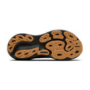 Close-up of a shoe sole with brown and black design on a white background
