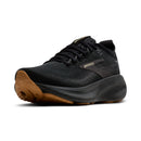 Black running shoe with brown sole on a white background