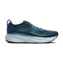 Blue running shoe with white sole on a white background