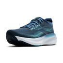 Blue running shoe with white sole on a white background