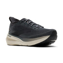 Black running shoe with beige sole on a white background