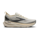 Gray and beige running shoe with 'Brooks' branding on a white background