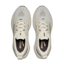 Pair of white running shoes with visible 'Brooks' branding on a white background