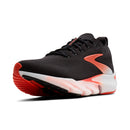 Black and red athletic shoe on a white background