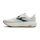 White running shoe with green accents on a white background