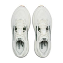 White running shoes with black branding on a white background