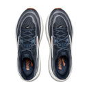 Pair of blue running shoes with white soles on a white background