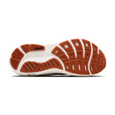 Sole of a shoe with brown and white sole design on a white background