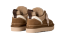 Brown suede shoes with fur lining on a white background