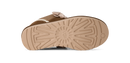 Brown sandal with a textured sole on a white background