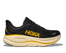 Black and yellow running shoe with 'Hoka' branding on a white background