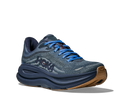 Blue running shoe with brown sole on a white background