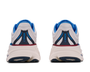 White running shoes with blue and red accents on a white background