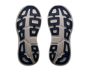 Top view of a pair of shoes with a visible brand logo on a white background