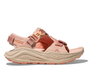 Pink sandal with beige sole on a white background