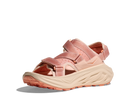 Pink sandal with a beige sole on a white background