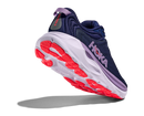 Navy running shoe with red sole on a white background