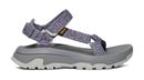 Gray sandal with purple straps on a white background
