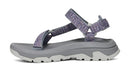 Black sandal with multiple straps on a white background
