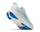 White and blue running shoe with 'Hoka' branding on a white background
