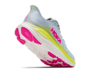 Hoka running shoe with pink and yellow sole on a white background