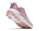 A single Hoka running shoe in dusty pink and white, shown from a three-quarters angle against a plain white background.
