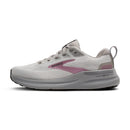 White running shoe with pink accents on a white background