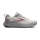 White running shoe with pink accents on a white background