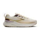 Beige and brown running shoe with 'Brooks' branding on a white background