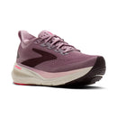 Pink running shoe with a white sole on a white background