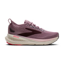 Purple running shoe with 'Brooks' branding on a white background