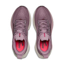 Pair of purple running shoes with red interior on a white background