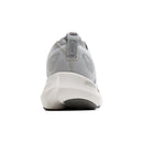 Gray sneaker with white sole on a white background