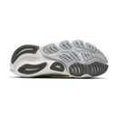 Sole of a running shoe with tread pattern on a white background