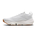 White running shoe with a brown sole on a white background