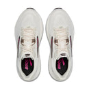 White running shoes with pink and black accents on a white background