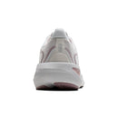White athletic shoe with a visible sole on a white background